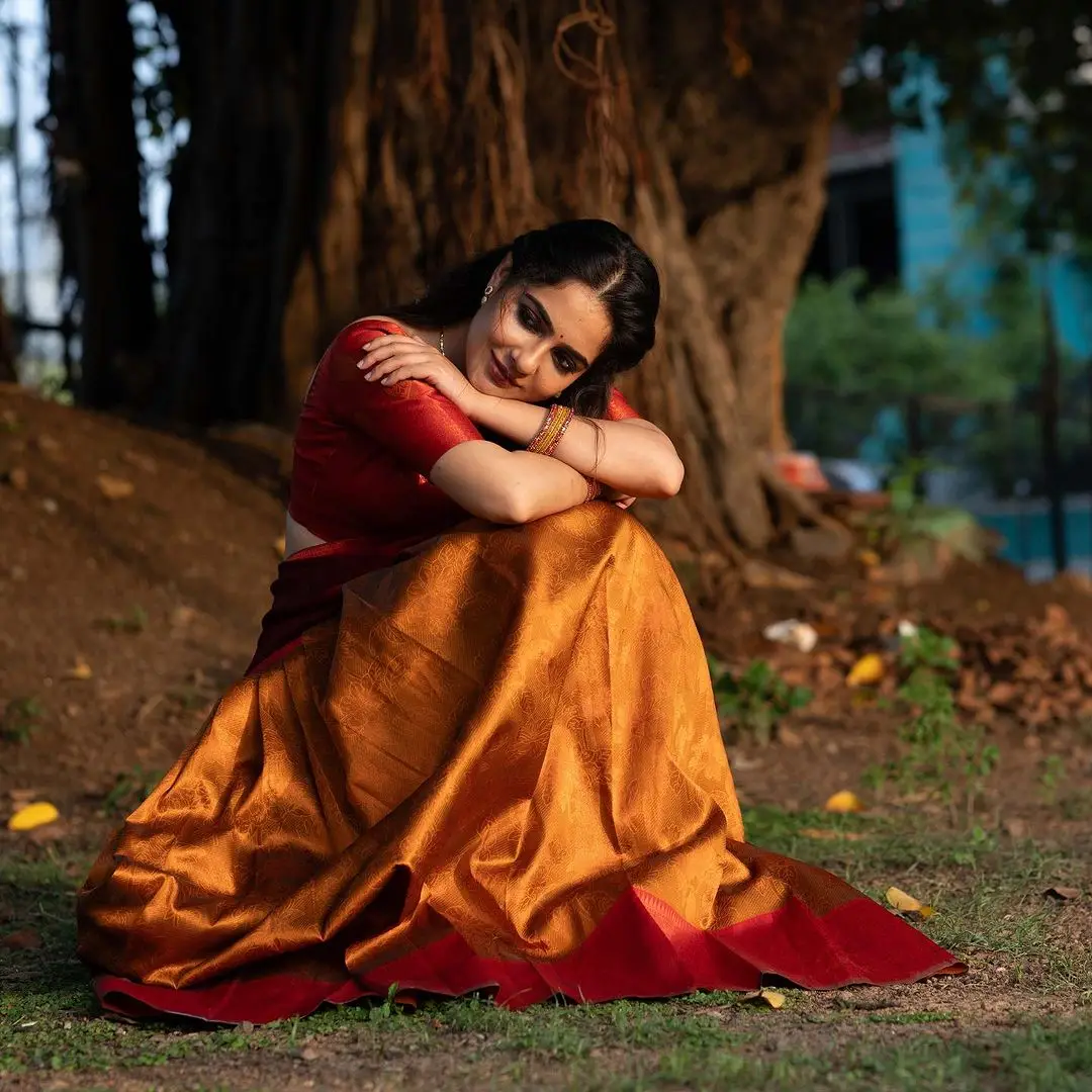 Malvi Malhotra Stills in Orange Lehenga Red Choli Maroon Voni